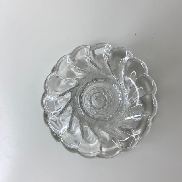 Elevate your table or mantel with this elegant pair of vintage Fostoria Colony candle holders. Crafted in the mid-20th...