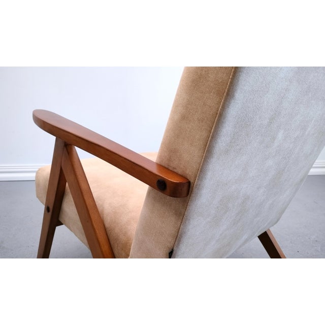 This is a very famous chair, model B-310 VAR, that was manufactured in the 60's in Poland. These armchairs were produced...