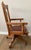 Antique oak swivel desk chair, likely dating from the early 20th century around 1900 to 1920. Crafted from solid oak with...