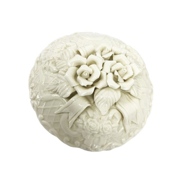 This vintage porcelain roses dresser box is a dainty treasure that seamlessly combines elegance and sentimentality. The...