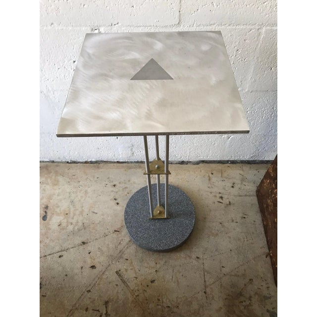 Postmodern Memphis style telephone accent occasional side end or drinks table, rendered in steel and brass with a tromp l...