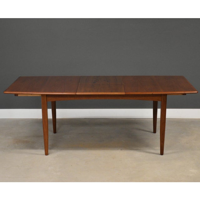 Wood Mid 20th Century Danish Modern Teak Butterfly Leaf Dining Table For Sale - Image 7 of 13