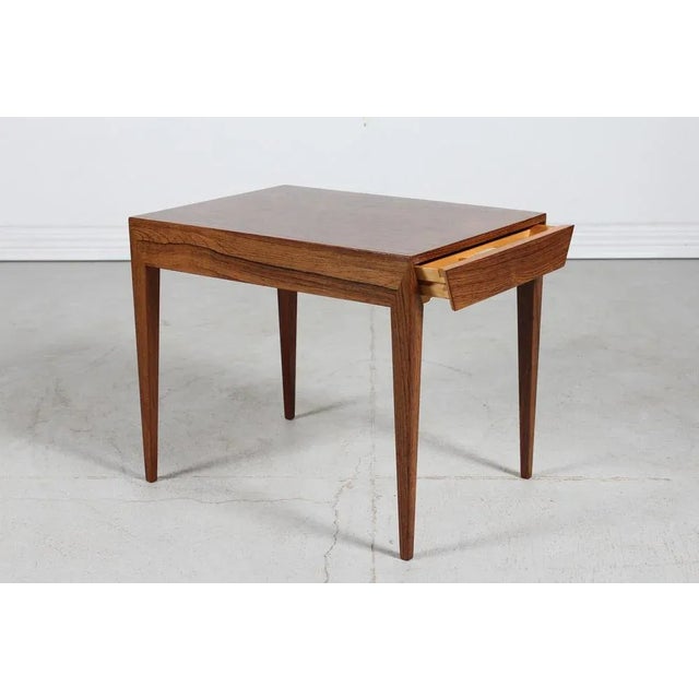 Danish designer Severin Hansen sewing table with drawer made of rosewood. Manufactured by Haslev Møbelfabrik in Denmark....