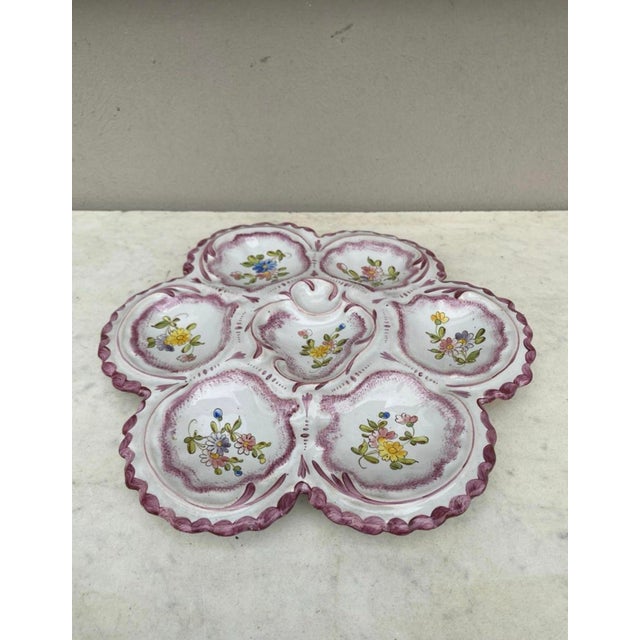 vely large French faience oyster plate in pastel colors with flowers, circa 1900 signed Alfred Renoleau Angouleme.