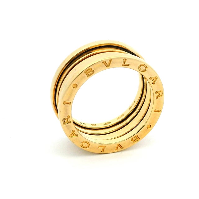 An iconic Bulgari B.zero1 ring crafted in 18-karat yellow gold, featuring the signature architectural design inspired by...
