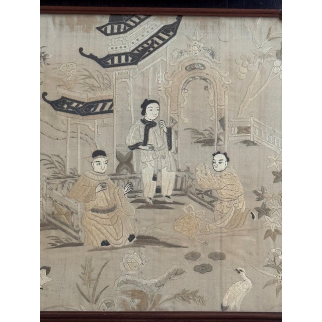 An exquisite, decorator-grade paired set of two (2) antique late 19th-century Chinese silk embroidery figural panels....