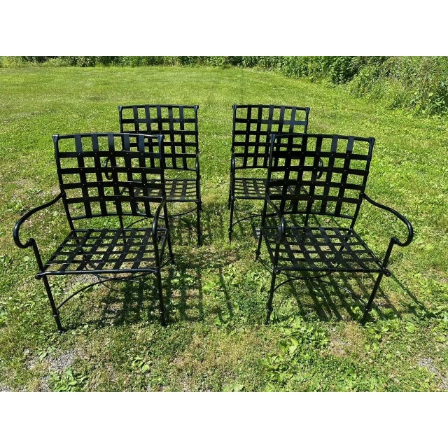 Top of the line aluminum dining patio set attributed to Brown Jordan having round table with glass top and 4 handsome...
