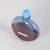 Lalique, Worth "Je Reviens" crystal perfume bottle. Decorative crystal perfume bottle with an oval body in blue and amber...