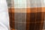 Sandra Jordan Prima Alpaca in Caribbean and Burnt Orange Plaid, complemented with 100% Cotton Chocolate Velvet backing,...