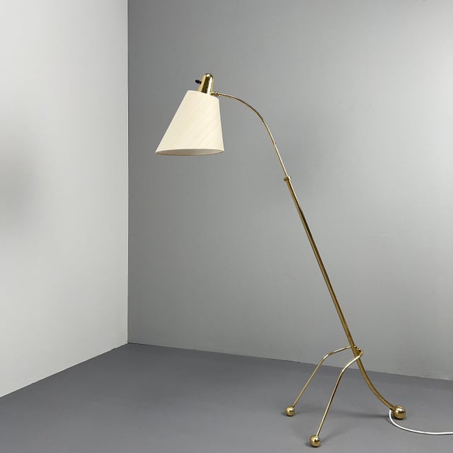 Stylish, giraffe-like floor lamp with an elegant brass frame and a newly made wild silk shade. Excellent condition, height...