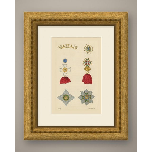 This is an original antique wood engraving, colored by hand, showing insignia of the order of the white falcon of saxe...