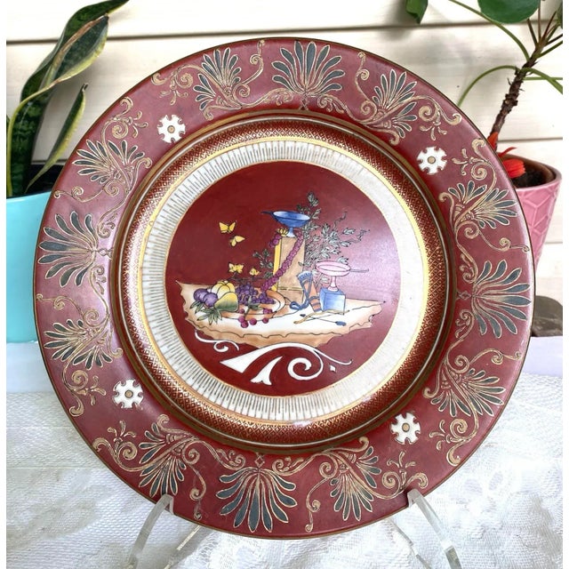 The plates are modern reproductions of a dessert service commissioned by Prince Jérôme Bonaparte in 1856. The motifs were...