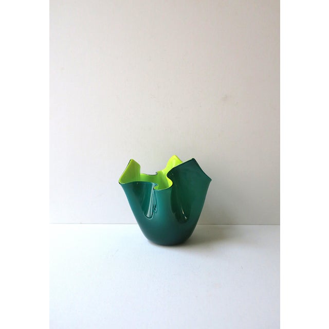 An Italian Murano art glass handkerchief vase by Venini Murano, circa late-20th century, Italy. A beautiful combination of...