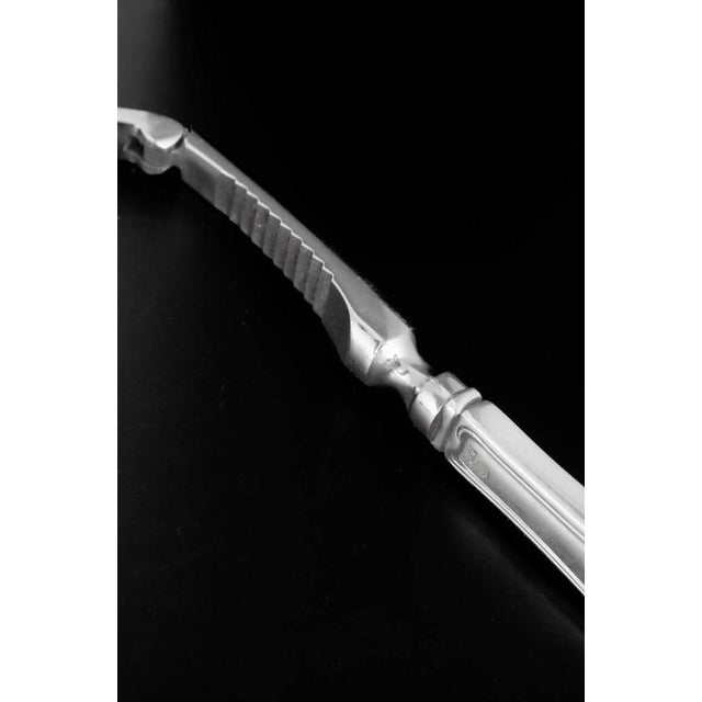 Georg Jensen, nut cracker Old Danish. Elegant nut cracker in stainless steel and sterling silver with handles in the Old...