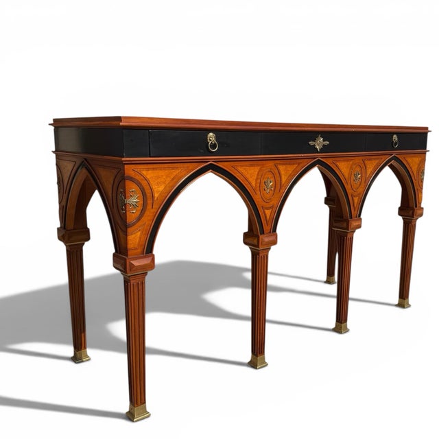 A beautiful console table designed by Mario Buatta for Widdicomb. Classic Gothic Regency style reflective of Buatta's...