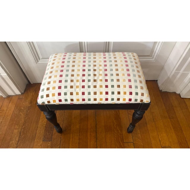 This charming small-scale bench features a classic painted wood base with turned legs and a tailored upholstered cushion....
