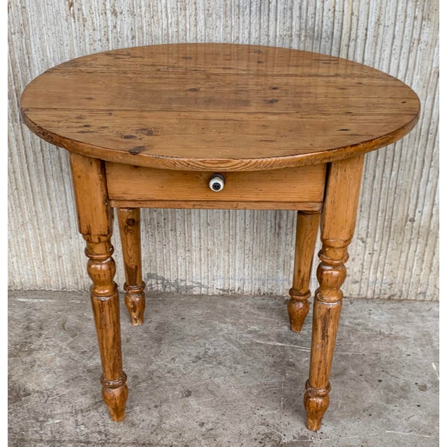 19th Spanish country pine side oval table or coffee table with drawer Antique pine "mobile" farmhouse side table made in...