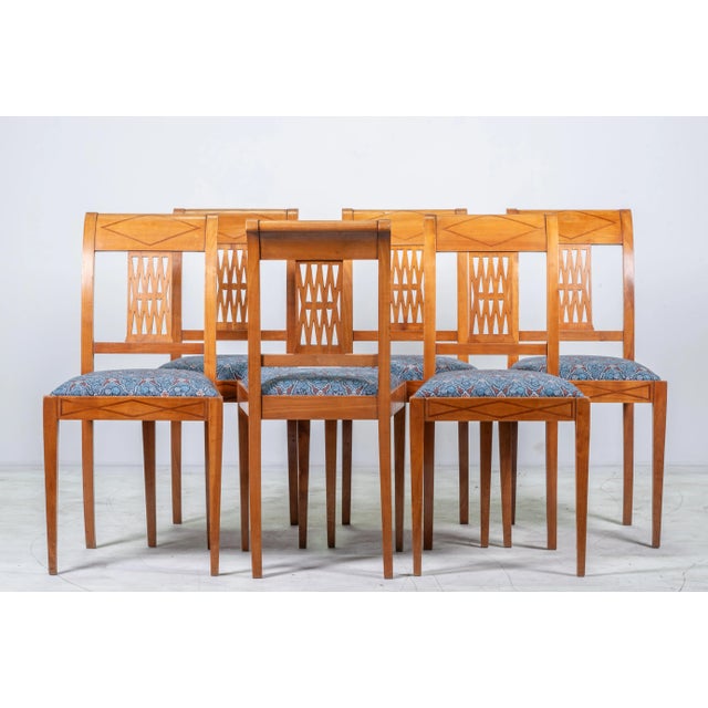 This stunning set of six French Art Deco dining chairs from the early 20th century brings timeless elegance and modern...