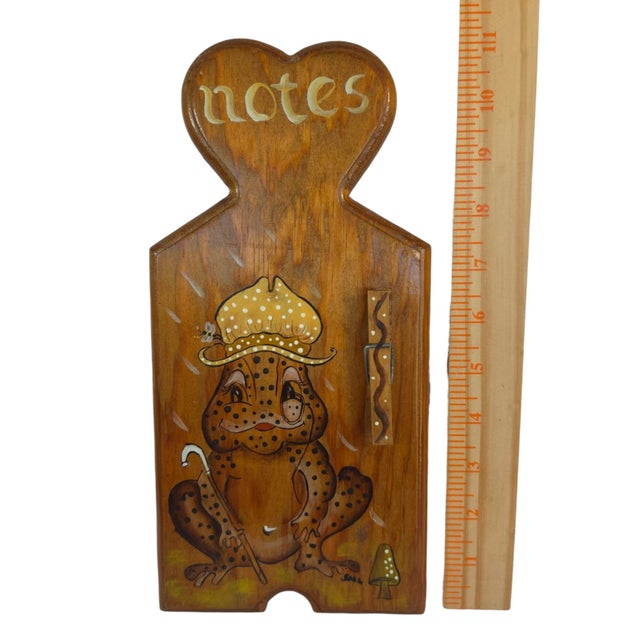 Charming vintage handmade wooden note holder featuring a whimsical hand-painted mushroom character. Artist-signed with...