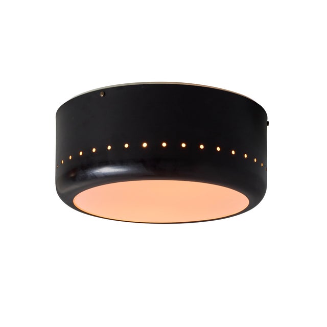 1950s Pierre Guariche Model G20 Ceiling Lamp for Disderot. A quintessentially 1950s French design executed in perforated...