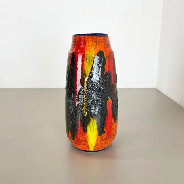 Fat lava art vase, heavy Brutalist glaze Producer: Scheurich, Germany Decade: 1970s This original vintage vase was...