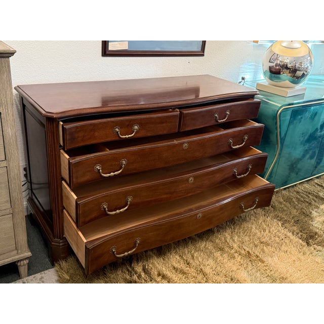 Design Plus Gallery presents a Mahogany Chest of Drawers from Davis Cabinet Company. The mahogany chest has classic...