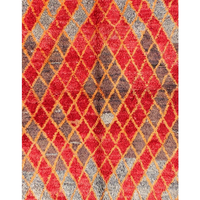 Tribal Mid 20th Century Midcentury Moroccan Rug With Orange, Red, Brown Diamonds and Blue Fringe Detail For Sale - Image 3 of 7