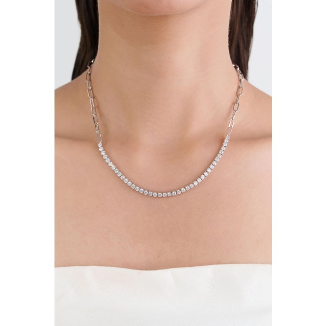 This Diamond Tennis Paperclip Chain Necklace featuring 4.44 carats of natural diamonds, set in luxurious 14K white gold....