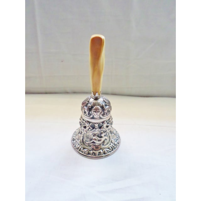 This is a Antique Gorham Rare Ornate Silver Bell with a Handle. The Bell is from the 19th century and shows an Exquisite...