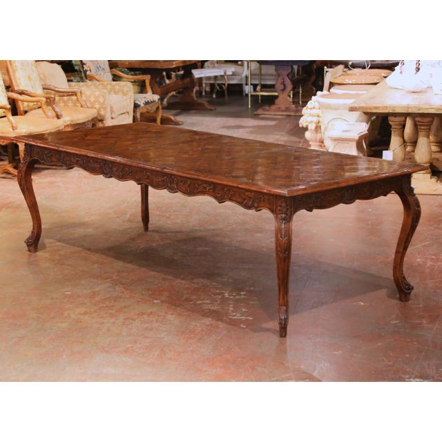 This refined dining set was produced by Guy Chaddock & Co. as part of the Clarence Collection, crafted in the United...