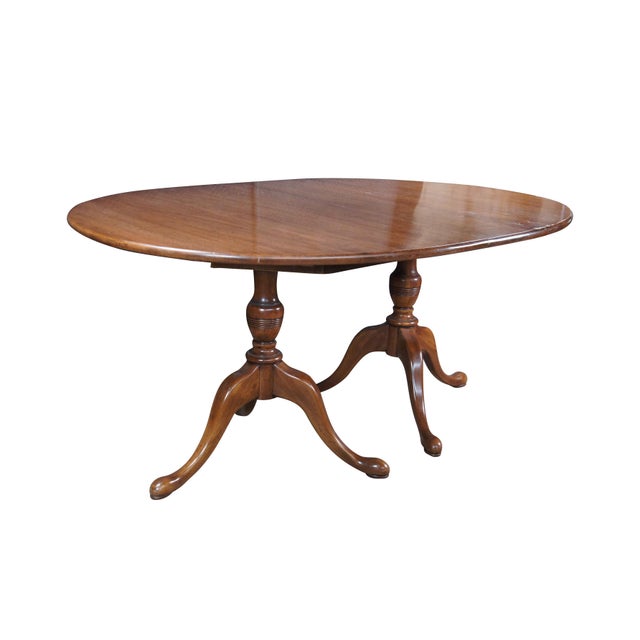 Vintage Davis Cabinet Company Cumberland Valley Oval Dining Table #1257, circa 1960s. Features a distressed walnut...