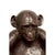 A cast bronze sculpture of a Charlie the Monkey with his arms forming a bowl. This lost wax cast bronze monkey is part of...