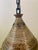 This charming pendant lamp features a textured ceramic shade with a pierced pattern , and dome shape, and a hanging chain....