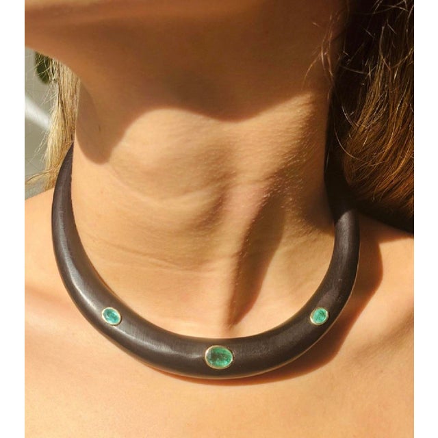 Wood Collar Necklace Wood, Zambian Emeralds & 14k Gold Black wood with three oval emeralds, all bezeled in 14k Gold. The...