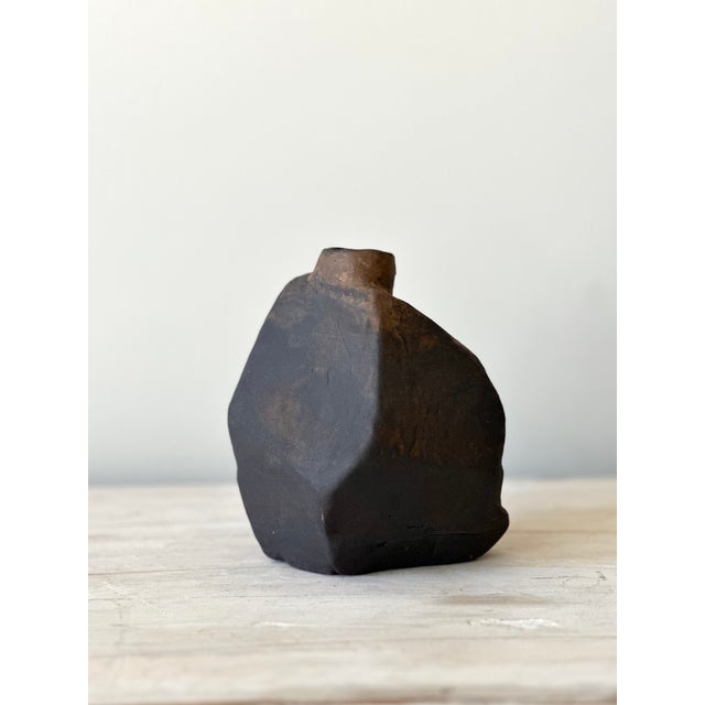 Trent Kendrick VESSEL - CANTO stoneware with glaze Dark, faceted, self-contained. A form that looks less like something...