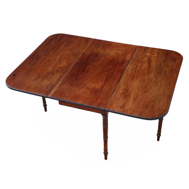 A charming early 19th-century folding table that is full of lovely age, colour, and patina, and rich with charm and...