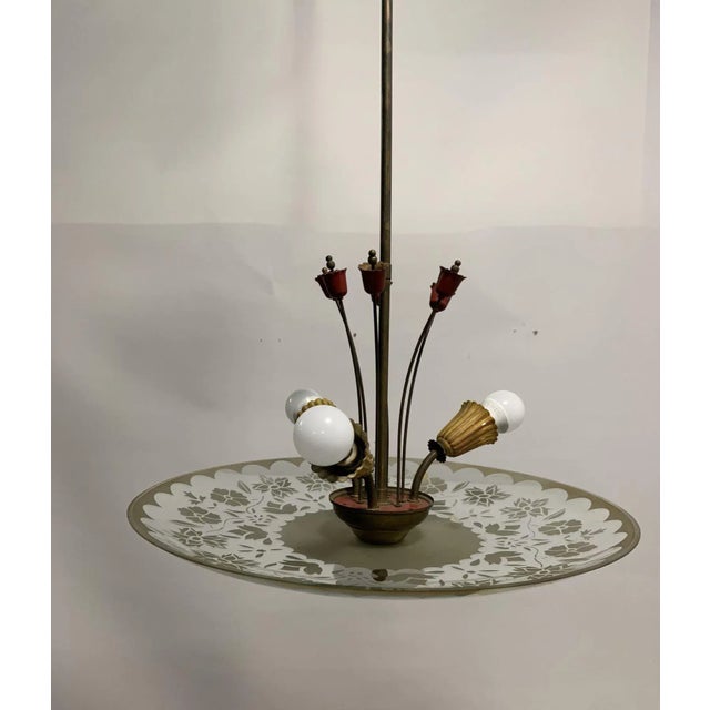 Chandelier stilnovo model totally sputnik brass with colored cones and black lacquer, extremely rare example. Up to 250V...