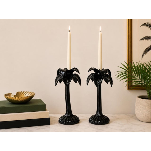 A pair of vintage Fitz & Floyd Japan ceramic candle holders featuring elegant sculptural palm tree forms in a dramatic...