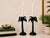 A pair of vintage Fitz & Floyd Japan ceramic candle holders featuring elegant sculptural palm tree forms in a dramatic...