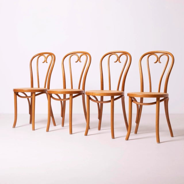 Thonet / Radomsko heart chair, set of 4, bent beech wood and HAND woven cane, Poland, circa 1980s, manufactured in former...