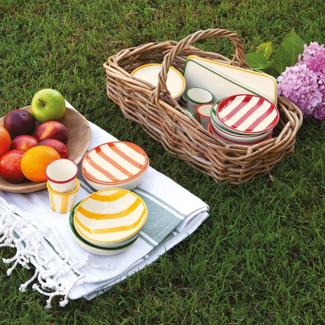 Hand-painted ceramic stoneware collection crafted in a historic factory in Civita Castellana Italy, a village where...