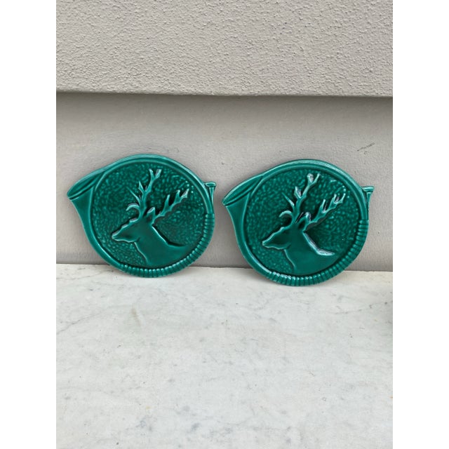 Pair of Mid-Century Green Majolica Deer Wine Coaster Bottle Vallauris. In a shape of an hunting horn.