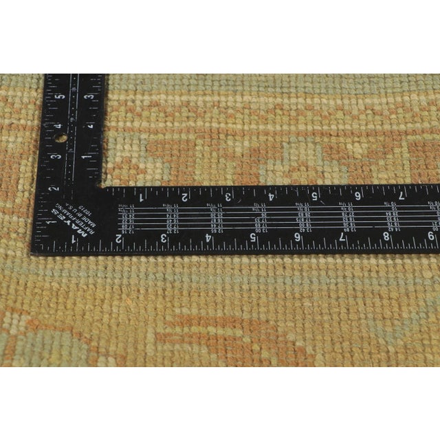 30185 Vintage Modern Oushak Rug, 09'05 x 13'06. This hand knotted wool Oushak rug features an all-over botanical pattern...