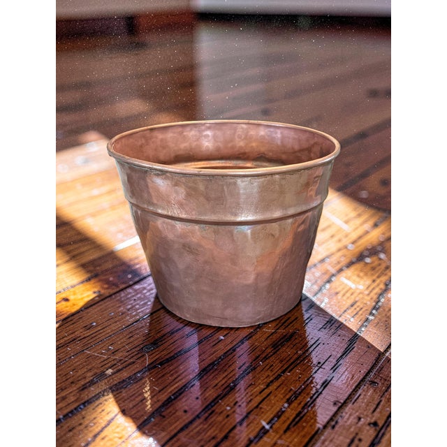 Bring historic warmth and texture to your tabletop with this 19th-century hand-hammered copper cachepot. Hand-raised with...