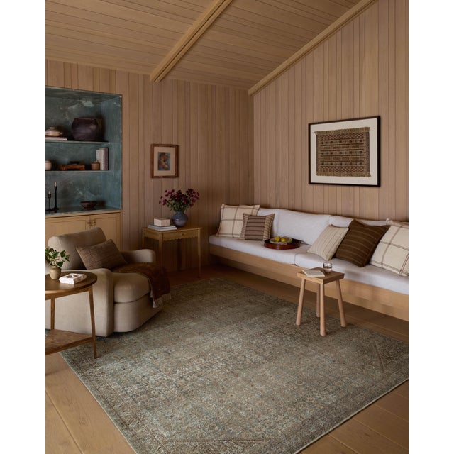 The Cambria Collection is a beautifully executed vintage-style area rug from Amber Lewis x Loloi with a blended jute and...