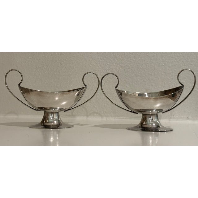 Antique pair of Continental European silver-plated open salt cellars dating to the late 19th or early 20th century....