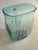 Soft aqua-blue colored glass vase from Blenko with pleated base. Includes original Blenko sticker as pictured. Dimensions:...