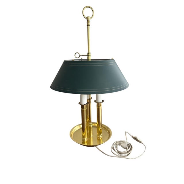 Elegant brass bouillotte-style desk lamp with double light and green metal shade. Classic French/English design, perfect...