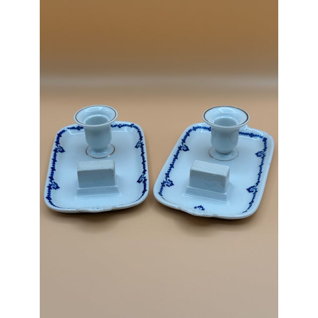 A charming matched pair of petite antique German porcelain chambersticks, circa 1890–1910. Each measures just 7” wide and...
