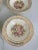 Offered is a lovely vintage set of dessert bowls by The Edwin M Knowles China Co. This set features a floral design with...